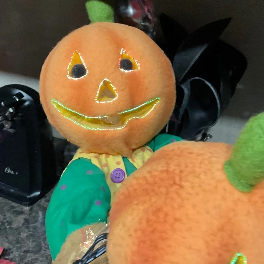 Festive Pumpkin Head Decor with Blue Overalls